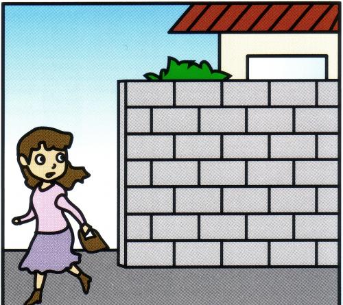 女性がブロック塀の近くを歩いているイラスト