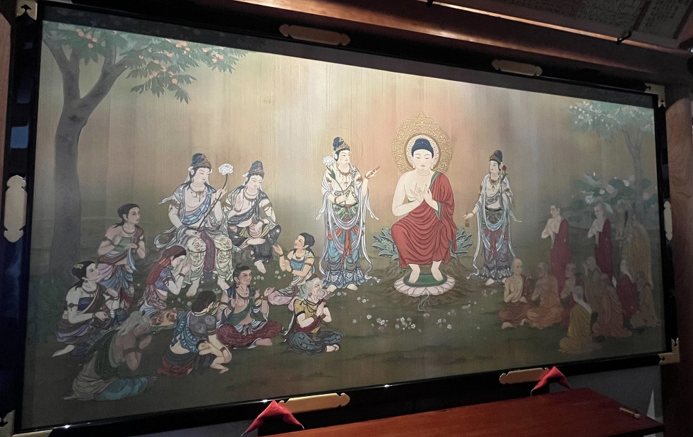 「釋迦説法図(しゃかせっぽうず)」板絵の写真