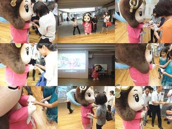 名刺を配っているいづみ姫の写真